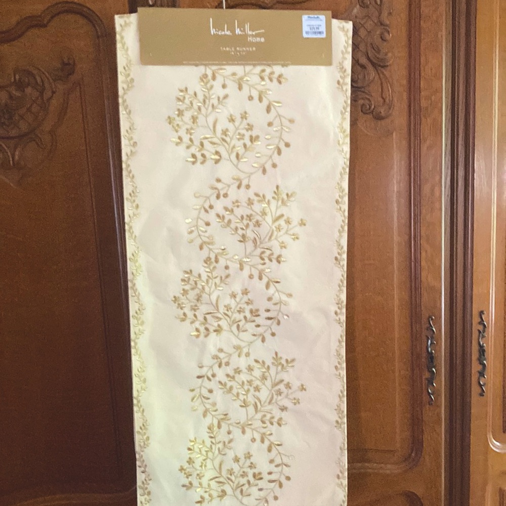 Nicole Miller table runner-16 in x 72 in.New w tags. Bone w gold embroidery.